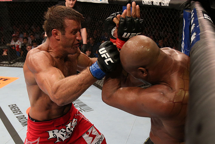 RIO DE JANEIRO, BRAZIL - OCTOBER 13:  (L-R) Stephan Bonnar punches Anderson Silva during their light heavyweight fight at UFC 153 inside HSBC Arena on October 13, 2012 in Rio de Janeiro, Brazil.  (Photo by Josh Hedges/Zuffa LLC/Zuffa LLC via Getty Images)