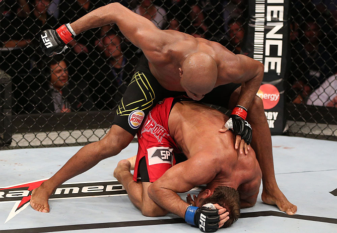 RIO DE JANEIRO, BRAZIL - OCTOBER 13:  (L-R) Anderson Silva punches Stephan Bonnar during their light heavyweight fight at UFC 153 inside HSBC Arena on October 13, 2012 in Rio de Janeiro, Brazil.  (Photo by Josh Hedges/Zuffa LLC/Zuffa LLC via Getty Images)