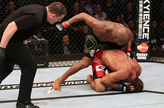 RIO DE JANEIRO, BRAZIL - OCTOBER 13:  (L-R) Anderson Silva punches Stephan Bonnar during their light heavyweight fight at UFC 153 inside HSBC Arena on October 13, 2012 in Rio de Janeiro, Brazil.  (Photo by Josh Hedges/Zuffa LLC/Zuffa LLC via Getty Images)