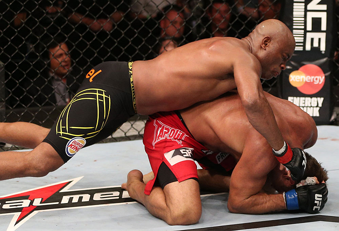 RIO DE JANEIRO, BRAZIL - OCTOBER 13:  (L-R) Anderson Silva punches Stephan Bonnar during their light heavyweight fight at UFC 153 inside HSBC Arena on October 13, 2012 in Rio de Janeiro, Brazil.  (Photo by Josh Hedges/Zuffa LLC/Zuffa LLC via Getty Images)