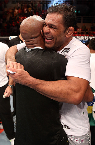 RIO DE JANEIRO, BRAZIL - OCTOBER 13:  (L-R) Anderson Silva and his teammate Antonio Rodrigo "Minotauro" Nogeuira celebrate after Silva's victory over Stephan Bonnar during their light heavyweight fight at UFC 153 inside HSBC Arena on October 13, 2012 in Rio de Janeiro, Brazil.  (Photo by Josh Hedges/Zuffa LLC/Zuffa LLC via Getty Images)