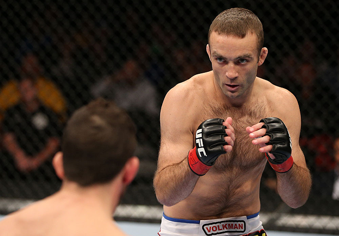 MINNEAPOLIS, MN - OCTOBER 05: (R-L) Jacob Volkmann squares off with Shane Roller during their lightweight fight at the UFC on FX event at Target Center on October 5, 2012 in Minneapolis, Minnesota. (Photo by Josh Hedges/Zuffa LLC/Zuffa LLC via Getty Images)