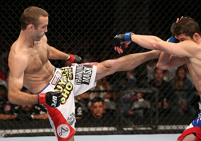 MINNEAPOLIS, MN - OCTOBER 05: (L-R) Jacob Volkmann kicks Shane Roller during their lightweight fight at the UFC on FX event at Target Center on October 5, 2012 in Minneapolis, Minnesota. (Photo by Josh Hedges/Zuffa LLC/Zuffa LLC via Getty Images)