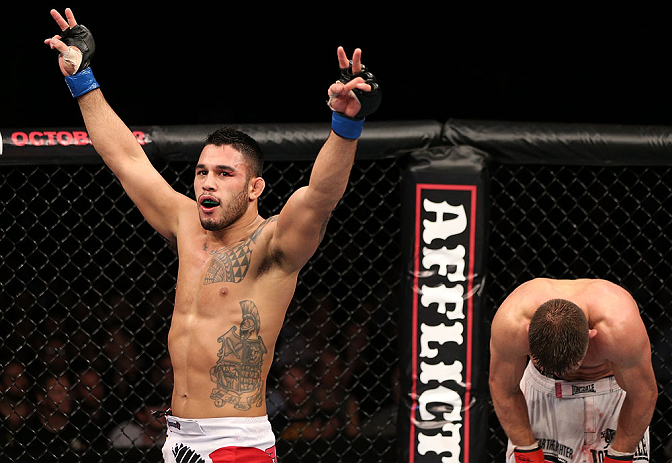 NOTTINGHAM, ENGLAND - SEPTEMBER 29: Brad Tavares (L) and Tom Watson react after their three-round battle at the UFC on Fuel TV event at Capital FM Arena on September 29, 2012 in Nottingham, England. (Photo by Josh Hedges/Zuffa LLC/Zuffa LLC via Getty Images)