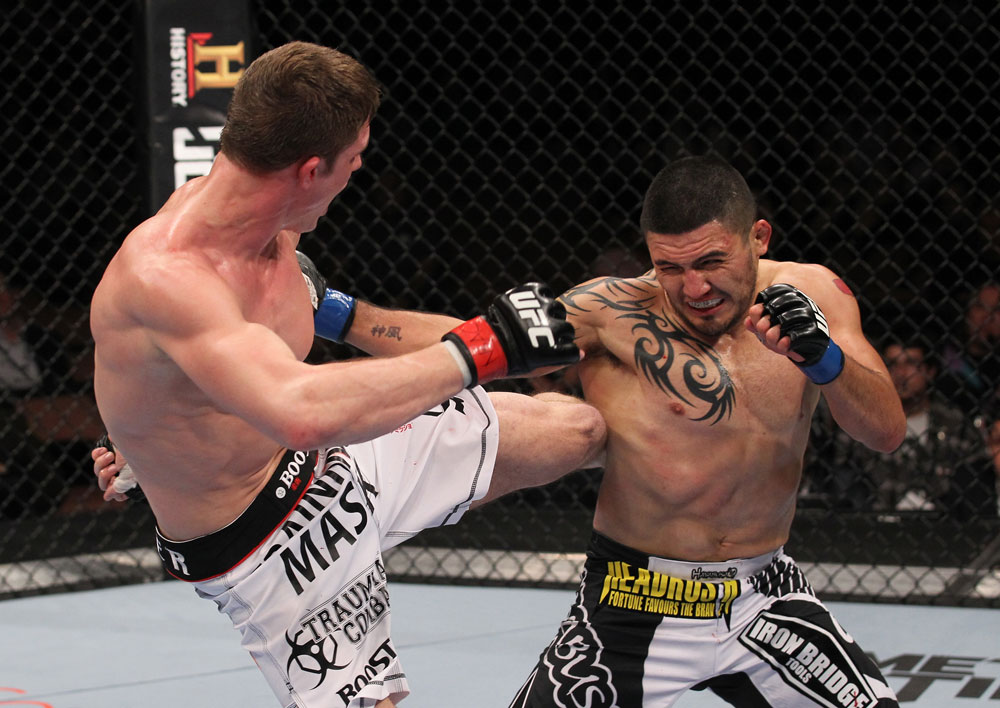 LAS VEGAS, NV - FEBRUARY 04:  Matt Riddle (left) kicks Henry Martinez during the UFC 143 event at Mandalay Bay Events Center on February 4, 2012 in Las Vegas, Nevada.  (Photo by Nick Laham/Zuffa LLC/Zuffa LLC via Getty Images) *** Local Caption *** Matt Riddle; Henry Martinez