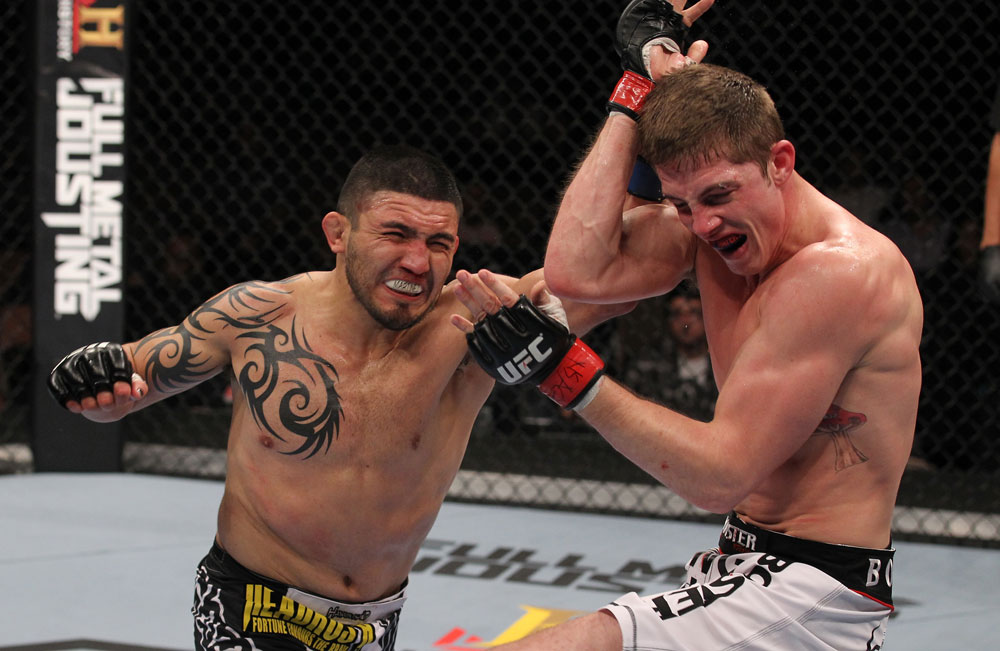 LAS VEGAS, NV - FEBRUARY 04:  (R-L) Henry Martinez punches Matt Riddle during the UFC 143 event at Mandalay Bay Events Center on February 4, 2012 in Las Vegas, Nevada.  (Photo by Nick Laham/Zuffa LLC/Zuffa LLC via Getty Images) *** Local Caption *** Henry Martinez; Matt Riddle