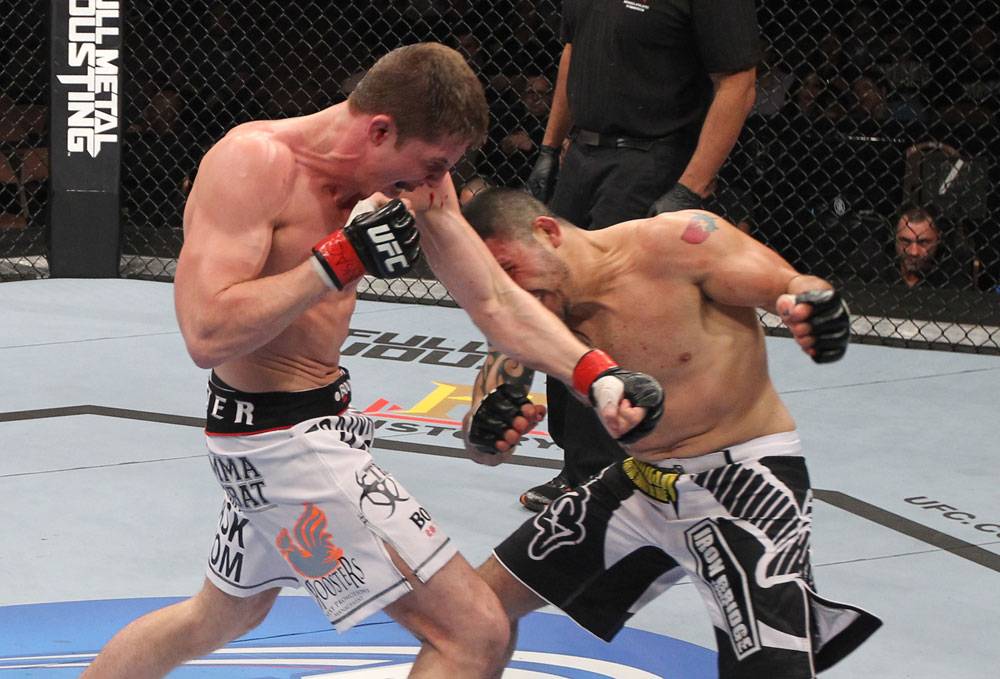 LAS VEGAS, NV - FEBRUARY 04:  (L-R) Matt Riddle and Henry Martinez exchange punches during the UFC 143 event at Mandalay Bay Events Center on February 4, 2012 in Las Vegas, Nevada.  (Photo by Nick Laham/Zuffa LLC/Zuffa LLC via Getty Images) *** Local Caption *** Matt Riddle; Henry Martinez