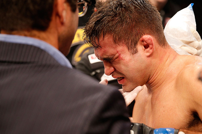 SAO PAULO, BRAZIL - JANUARY 19: Pedro Nobre is treated by doctors after an illegal strike from Yuri Alcantara in their bantamweight fight at the UFC on FX event on January 19, 2013 at Ibirapuera Gymnasium in Sao Paulo, Brazil. (Photo by Josh Hedges/Zuffa LLC/Zuffa LLC via Getty Images)