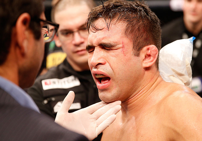 SAO PAULO, BRAZIL - JANUARY 19: Pedro Nobre is treated by doctors after an illegal strike from Yuri Alcantara in their bantamweight fight at the UFC on FX event on January 19, 2013 at Ibirapuera Gymnasium in Sao Paulo, Brazil. (Photo by Josh Hedges/Zuffa LLC/Zuffa LLC via Getty Images)