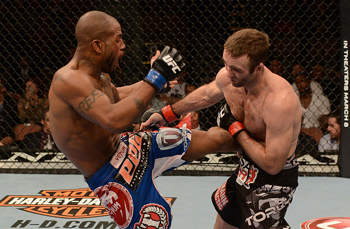 LAS VEGAS, NV - FEBRUARY 02: (L-R) Bobby Green kicks Jacob Volkmann during their lightweight fight at UFC 156 on February 2, 2013 at the Mandalay Bay Events Center in Las Vegas, Nevada. (Photo by Donald Miralle/Zuffa LLC/Zuffa LLC via Getty Images) *** Local Caption *** Jacob Volkmann; Bobby Green