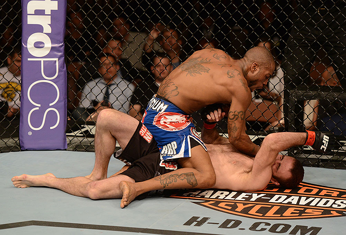 LAS VEGAS, NV - FEBRUARY 02: Bobby Green (top) punches Jacob Volkmann during their lightweight fight at UFC 156 on February 2, 2013 at the Mandalay Bay Events Center in Las Vegas, Nevada. (Photo by Donald Miralle/Zuffa LLC/Zuffa LLC via Getty Images) *** Local Caption *** Jacob Volkmann; Bobby Green