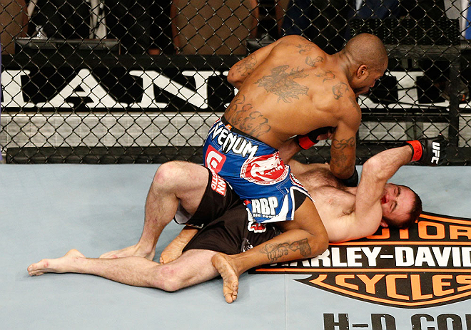 LAS VEGAS, NV - FEBRUARY 02: Bobby Green (top) punches Jacob Volkmann during their lightweight fight at UFC 156 on February 2, 2013 at the Mandalay Bay Events Center in Las Vegas, Nevada. (Photo by Josh Hedges/Zuffa LLC/Zuffa LLC via Getty Images) *** Local Caption *** Jacob Volkmann; Bobby Green