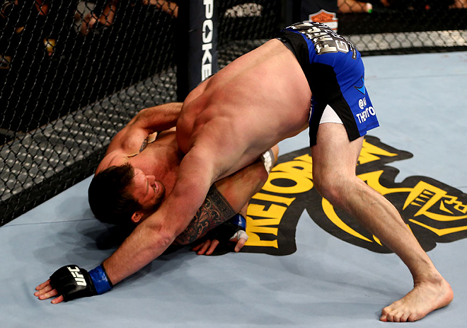 CHICAGO, IL - JANUARY 26:  Ryan Bader (L) chokes Vladimir Matyushenko (R) during their Light Heavyweight Bout part of UFC on FOX at United Center on January 26, 2013 in Chicago, Illinois.  (Photo by Al Bello/Zuffa LLC/Zuffa LLC Via Getty Images)