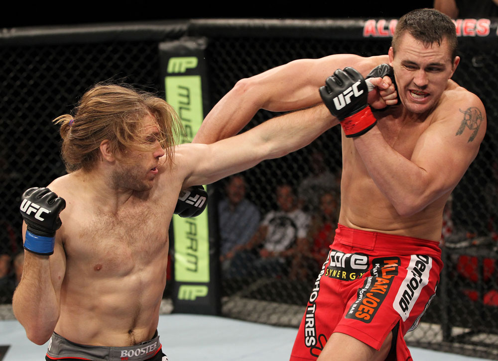 SYDNEY, AUSTRALIA - MARCH 03: (L-R) Andrew Craig punches Kyle Noke during a middleweight bout during the UFC on FX event at Allphones Arena on March 3, 2012 in Sydney, Australia. (Photo by Josh Hedges/Zuffa LLC/Zuffa LLC via Getty Images) *** Local Caption *** Kyle Noke; Andrew Craig