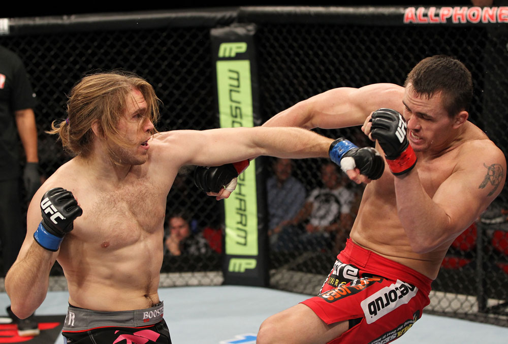 SYDNEY, AUSTRALIA - MARCH 03: (L-R) Andrew Craig punches Kyle Noke during a middleweight bout during the UFC on FX event at Allphones Arena on March 3, 2012 in Sydney, Australia. (Photo by Josh Hedges/Zuffa LLC/Zuffa LLC via Getty Images) *** Local Caption *** Kyle Noke; Andrew Craig