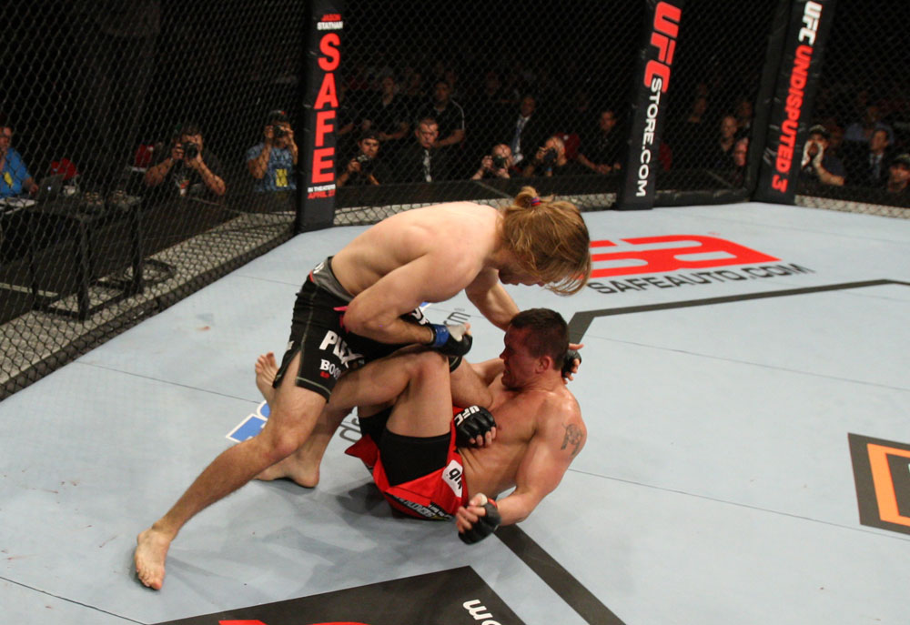 SYDNEY, AUSTRALIA - MARCH 03: (L-R) Andrew Craig punches Kyle Noke during a middleweight bout during the UFC on FX event at Allphones Arena on March 3, 2012 in Sydney, Australia. (Photo by Josh Hedges/Zuffa LLC/Zuffa LLC via Getty Images) *** Local Caption *** Kyle Noke; Andrew Craig