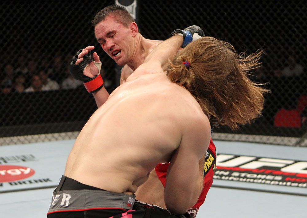 SYDNEY, AUSTRALIA - MARCH 03: (R-L) Andrew Craig punches Kyle Noke during a middleweight bout during the UFC on FX event at Allphones Arena on March 3, 2012 in Sydney, Australia. (Photo by Josh Hedges/Zuffa LLC/Zuffa LLC via Getty Images) *** Local Caption *** Kyle Noke; Andrew Craig