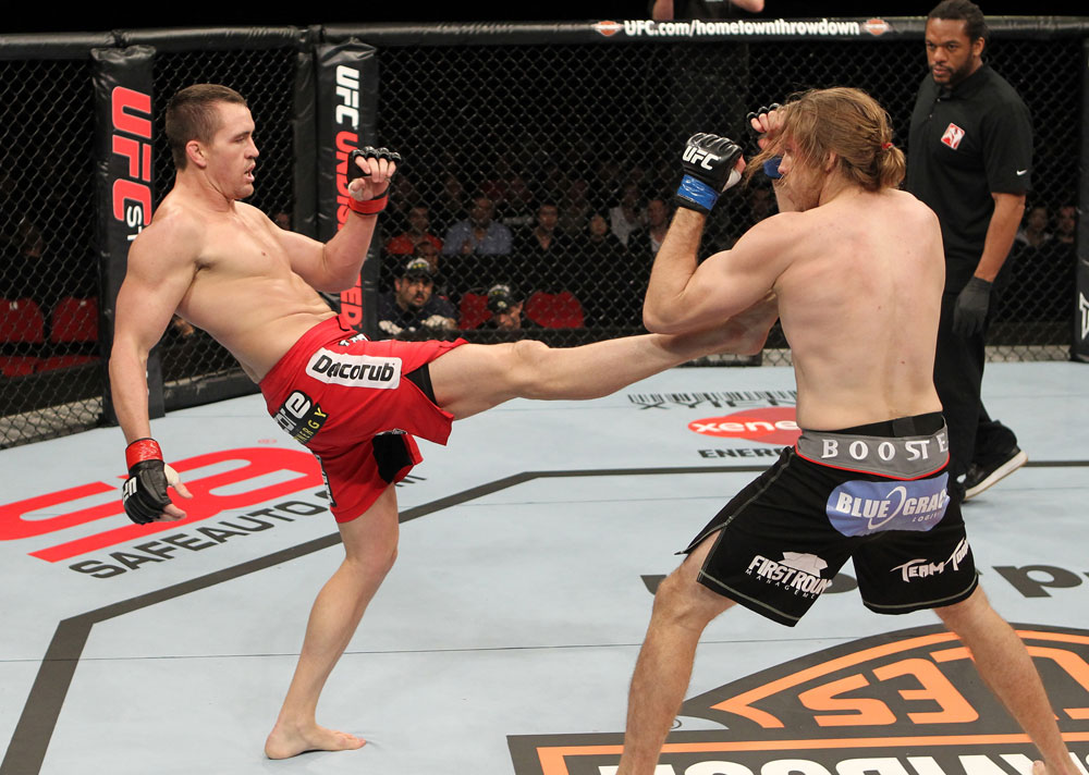 SYDNEY, AUSTRALIA - MARCH 03: (L-R) Kyle Noke kicks Andrew Craig in their middleweight bout during the UFC on FX event at Allphones Arena on March 3, 2012 in Sydney, Australia. (Photo by Josh Hedges/Zuffa LLC/Zuffa LLC via Getty Images) *** Local Caption *** Kyle Noke; Andrew Craig