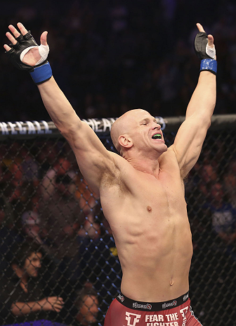 CALGARY, CANADA - JULY 21:  Ryan Jimmo celebrates after defeating Anthony Perosh by knockout in six seconds during round one of their light heavyweight bout at UFC 149 inside the Scotiabank Saddledome on July 21, 2012 in Calgary, Alberta, Canada.  (Photo by Nick Laham/Zuffa LLC/Zuffa LLC via Getty Images)