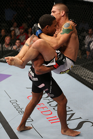 MINNEAPOLIS, MN - OCTOBER 05: (R-L) Carlo Prater attempts a flying triangle choke against Marcus LeVesseur at the UFC on FX event at Target Center on October 5, 2012 in Minneapolis, Minnesota. (Photo by Josh Hedges/Zuffa LLC/Zuffa LLC via Getty Images)