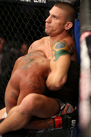 MINNEAPOLIS, MN - OCTOBER 05: (R-L) Carlo Prater attempts a guillotine choke against Marcus LeVesseur during their lightweight fight at the UFC on FX event at Target Center on October 5, 2012 in Minneapolis, Minnesota. (Photo by Josh Hedges/Zuffa LLC/Zuffa LLC via Getty Images)