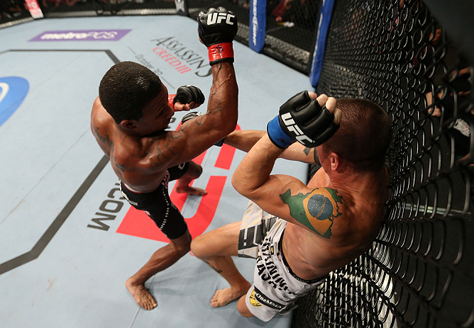 MINNEAPOLIS, MN - OCTOBER 05: (L-R) Marcus LeVesseur punches Carlo Prater during their lightweight fight at the UFC on FX event at Target Center on October 5, 2012 in Minneapolis, Minnesota. (Photo by Josh Hedges/Zuffa LLC/Zuffa LLC via Getty Images)