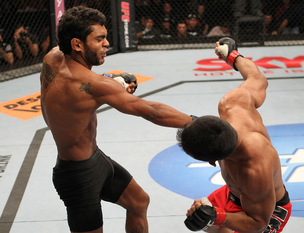 BELO HORIZONTE, BRAZIL - JUNE 23: (L-R) Hugo "Wolverine" Viana punches John Teixeira during their UFC 147 featherweight bout at Estadio Jornalista Felipe Drummond on June 23, 2012 in Belo Horizonte, Brazil. (Photo by Josh Hedges/Zuffa LLC/Zuffa LLC via Getty Images)