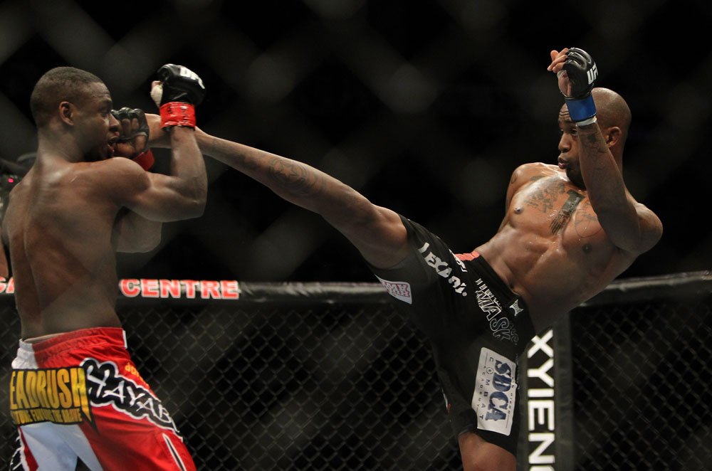 TORONTO, ON - DECEMBER 10:  (R-L) Walel Watson kicks Yves Jabouin during the UFC 140 event at Air Canada Centre on December 10, 2011 in Toronto, Ontario, Canada.  (Photo by Josh Hedges/Zuffa LLC/Zuffa LLC via Getty Images)