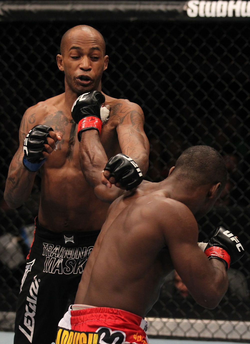 TORONTO, ON - DECEMBER 10:  (R-L) Yves Jabouin punches Walel Watson during the UFC 140 event at Air Canada Centre on December 10, 2011 in Toronto, Ontario, Canada.  (Photo by Nick Laham/Zuffa LLC/Zuffa LLC via Getty Images)