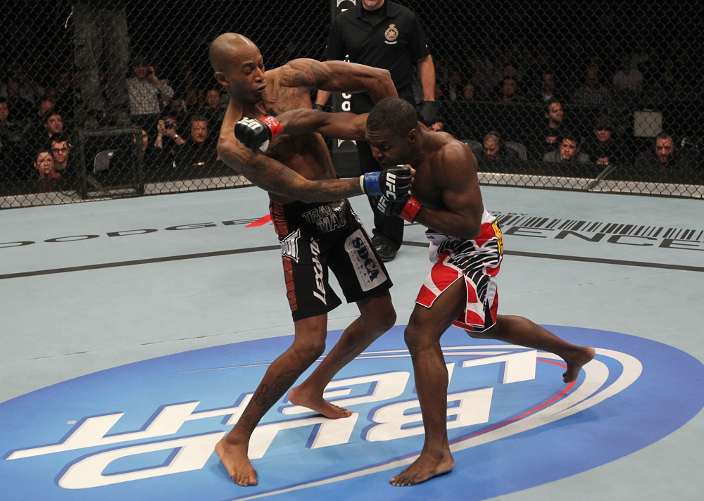 TORONTO, ON - DECEMBER 10:  (R-L) Yves Jabouin punches Walel Watson during the UFC 140 event at Air Canada Centre on December 10, 2011 in Toronto, Ontario, Canada.  (Photo by Nick Laham/Zuffa LLC/Zuffa LLC via Getty Images)