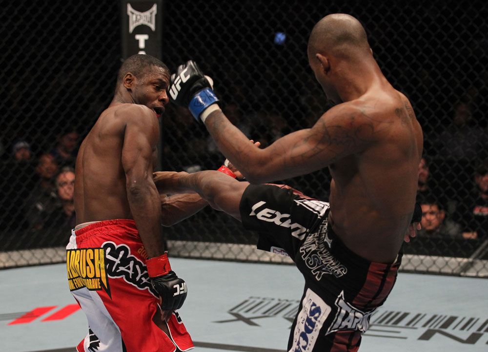 TORONTO, ON - DECEMBER 10:  (R-L) Walel Watson kicks Yves Jabouin during the UFC 140 event at Air Canada Centre on December 10, 2011 in Toronto, Ontario, Canada.  (Photo by Nick Laham/Zuffa LLC/Zuffa LLC via Getty Images)
