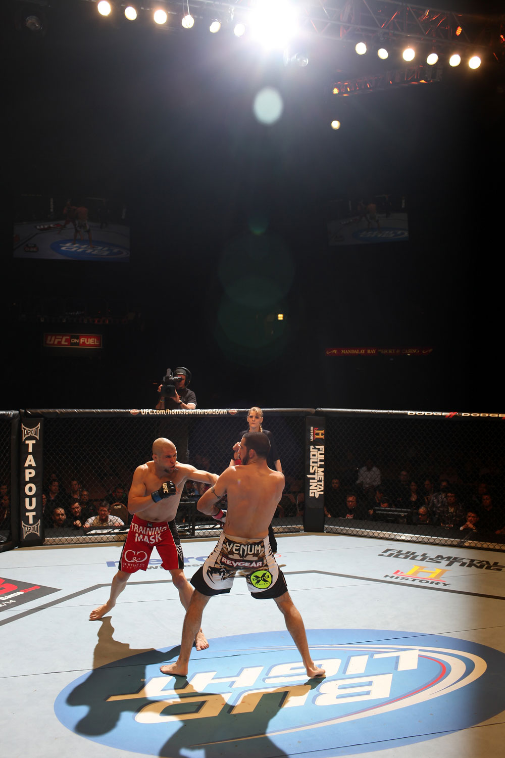 LAS VEGAS, NV - FEBRUARY 04:  Chris Cope (left) punches Matt Brown during the UFC 143 event at Mandalay Bay Events Center on February 4, 2012 in Las Vegas, Nevada.  (Photo by Nick Laham/Zuffa LLC/Zuffa LLC via Getty Images) *** Local Caption *** Chris Cope; Matt Brown