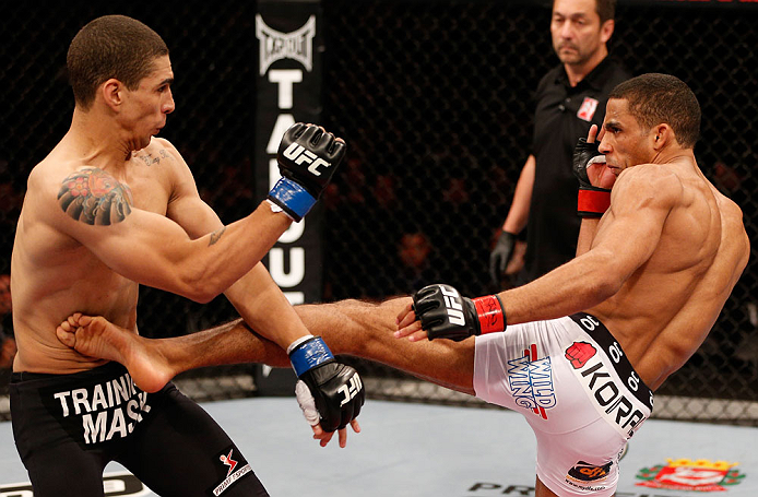 SAO PAULO, BRAZIL - JANUARY 19: (R-L) Edson Barboza kicks Lucas Martins in their lightweight fight at the UFC on FX event on January 19, 2013 at Ibirapuera Gymnasium in Sao Paulo, Brazil. (Photo by Josh Hedges/Zuffa LLC/Zuffa LLC via Getty Images)