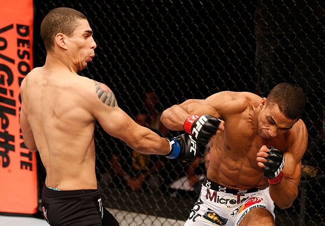 SAO PAULO, BRAZIL - JANUARY 19: (R-L) Edson Barboza punches Lucas Martins in their lightweight fight at the UFC on FX event on January 19, 2013 at Ibirapuera Gymnasium in Sao Paulo, Brazil. (Photo by Josh Hedges/Zuffa LLC/Zuffa LLC via Getty Images)