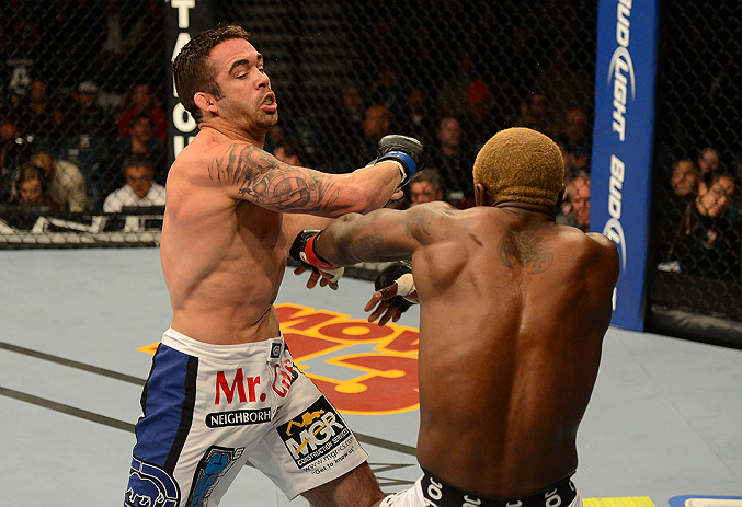 LAS VEGAS, NV - DECEMBER 29:  (L-R) Jamie Varner punches Melvin Guillard during their lightweight fight at UFC 155 on December 29, 2012 at MGM Grand Garden Arena in Las Vegas, Nevada. (Photo by Donald Miralle/Zuffa LLC/Zuffa LLC via Getty Images) *** Local Caption *** Melvin Guillard; Jamie Varner