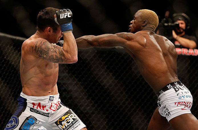 LAS VEGAS, NV - DECEMBER 29:  (R-L) Melvin Guillard punches Jamie Varner during their lightweight fight at UFC 155 on December 29, 2012 at MGM Grand Garden Arena in Las Vegas, Nevada. (Photo by Josh Hedges/Zuffa LLC/Zuffa LLC via Getty Images) *** Local Caption *** Melvin Guillard; Jamie Varner