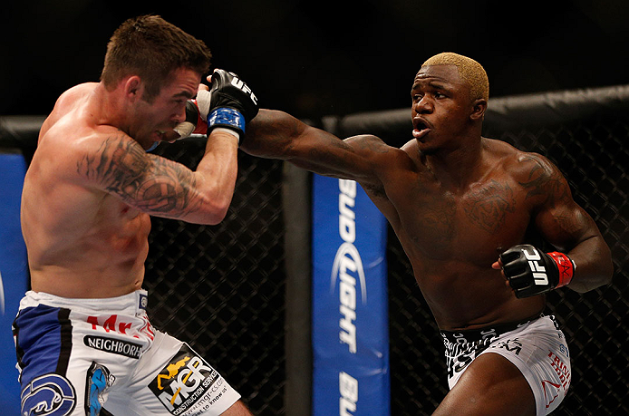 LAS VEGAS, NV - DECEMBER 29:  (R-L) Melvin Guillard punches Jamie Varner during their lightweight fight at UFC 155 on December 29, 2012 at MGM Grand Garden Arena in Las Vegas, Nevada. (Photo by Josh Hedges/Zuffa LLC/Zuffa LLC via Getty Images) *** Local Caption *** Melvin Guillard; Jamie Varner