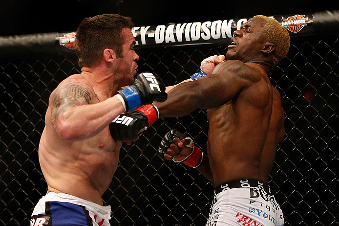 LAS VEGAS, NV - DECEMBER 29:  (L-R) Jamie Varner punches Melvin Guillard during their lightweight fight at UFC 155 on December 29, 2012 at MGM Grand Garden Arena in Las Vegas, Nevada. (Photo by Josh Hedges/Zuffa LLC/Zuffa LLC via Getty Images) *** Local Caption *** Melvin Guillard; Jamie Varner