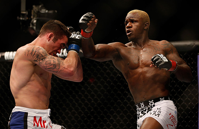 LAS VEGAS, NV - DECEMBER 29:  (R-L) Melvin Guillard punches Jamie Varner during their lightweight fight at UFC 155 on December 29, 2012 at MGM Grand Garden Arena in Las Vegas, Nevada. (Photo by Josh Hedges/Zuffa LLC/Zuffa LLC via Getty Images) *** Local Caption *** Melvin Guillard; Jamie Varner