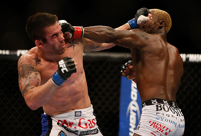 LAS VEGAS, NV - DECEMBER 29:  (L-R) Jamie Varner and Melvin Guillard exchange punches during their lightweight fight at UFC 155 on December 29, 2012 at MGM Grand Garden Arena in Las Vegas, Nevada. (Photo by Josh Hedges/Zuffa LLC/Zuffa LLC via Getty Images) *** Local Caption *** Melvin Guillard; Jamie Varner