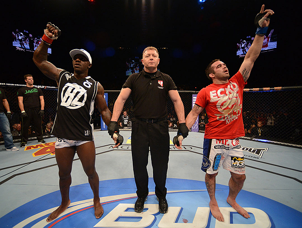 LAS VEGAS, NV - DECEMBER 29:  Melvin Guillard (left) and Jamie Varner (right) await the official decision after their lightweight fight at UFC 155 on December 29, 2012 at MGM Grand Garden Arena in Las Vegas, Nevada. (Photo by Donald Miralle/Zuffa LLC/Zuffa LLC via Getty Images) *** Local Caption *** Melvin Guillard; Jamie Varner