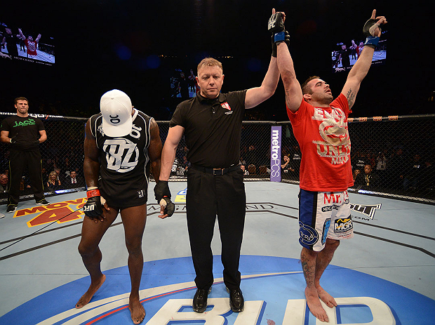 LAS VEGAS, NV - DECEMBER 29:  Jamie Varner (right) reacts to being declared the winner over Melvin Guillard (left) after their lightweight fight at UFC 155 on December 29, 2012 at MGM Grand Garden Arena in Las Vegas, Nevada. (Photo by Donald Miralle/Zuffa LLC/Zuffa LLC via Getty Images) *** Local Caption *** Melvin Guillard; Jamie Varner