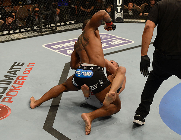 LAS VEGAS, NV - FEBRUARY 02: Tyron Woodley (top) punches Jay Hieron during their welterweight fight at UFC 156 on February 2, 2013 at the Mandalay Bay Events Center in Las Vegas, Nevada. (Photo by Donald Miralle/Zuffa LLC/Zuffa LLC via Getty Images) *** Local Caption *** Jay Hieron; Tyron Woodley
