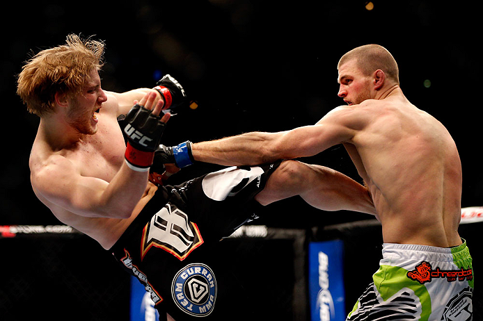CHICAGO, IL - JANUARY 26:  Pascal Krauss (R) fights Mike Stumpf (L) during their Welterweight Bout part of UFC on FOX at United Center on January 26, 2013 in Chicago, Illinois.  (Photo by Josh Hedges/Zuffa LLC/Zuffa LLC Via Getty Images)