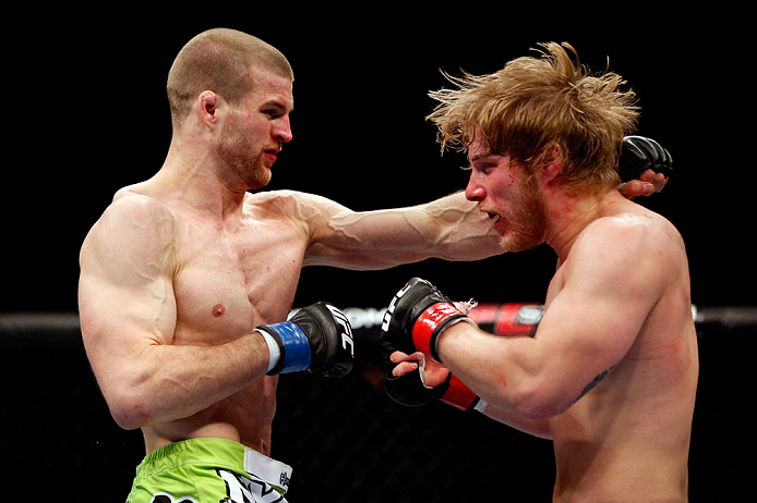 CHICAGO, IL - JANUARY 26:  Pascal Krauss (L) punches Mike Stumpf (R) during their Welterweight Bout part of UFC on FOX at United Center on January 26, 2013 in Chicago, Illinois.  (Photo by Josh Hedges/Zuffa LLC/Zuffa LLC Via Getty Images)