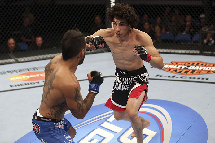 CALGARY, CANADA - JULY 21:  (R-L) Roland Delorme lunges at Francisco Rivera during their bantamweight bout at UFC 149 inside the Scotiabank Saddledome on July 21, 2012 in Calgary, Alberta, Canada.  (Photo by Nick Laham/Zuffa LLC/Zuffa LLC via Getty Images)