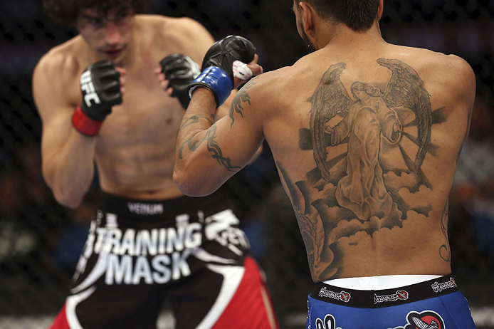 CALGARY, CANADA - JULY 21: (L-R) Roland Delorme looks to attack Francisco Rivera during their bantamweight bout at UFC 149 inside the Scotiabank Saddledome on July 21, 2012 in Calgary, Alberta, Canada.  (Photo by Nick Laham/Zuffa LLC/Zuffa LLC via Getty Images)