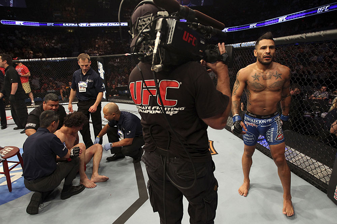CALGARY, CANADA - JULY 21: (R-L) Francisco Rivera celebrates after defeating Roland Delorme during their bantamweight bout at UFC 149 inside the Scotiabank Saddledome on July 21, 2012 in Calgary, Alberta, Canada.  (Photo by Nick Laham/Zuffa LLC/Zuffa LLC via Getty Images)