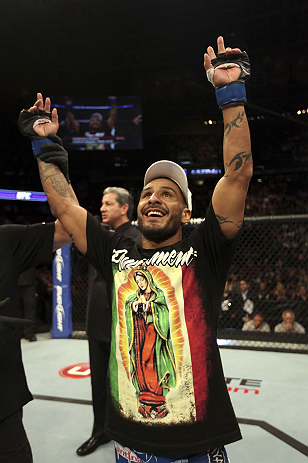 CALGARY, CANADA - JULY 21:  Francisco Rivera celebrates after defeating Roland Delorme during their bantamweight bout at UFC 149 inside the Scotiabank Saddledome on July 21, 2012 in Calgary, Alberta, Canada.  (Photo by Nick Laham/Zuffa LLC/Zuffa LLC via Getty Images)
