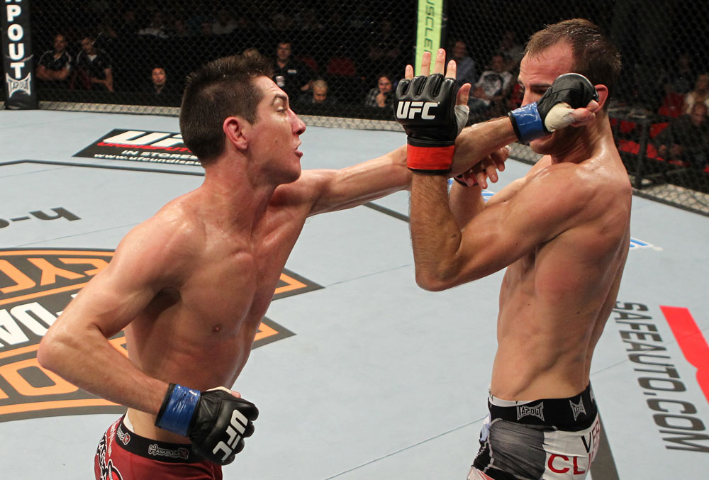 SYDNEY, AUSTRALIA - MARCH 03: (L-R) Steven Siler punches Cole Miller in a featherweight bout during the UFC on FX event at Allphones Arena on March 3, 2012 in Sydney, Australia. (Photo by Josh Hedges/Zuffa LLC/Zuffa LLC via Getty Images) *** Local Caption *** Cole Miller; Steven Siler